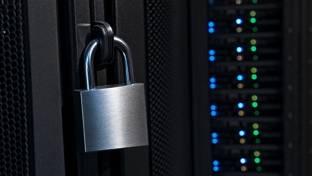 A close-up of a secured server rack with a padlock, symbolizing data security and protection in modern technology infrastructure.