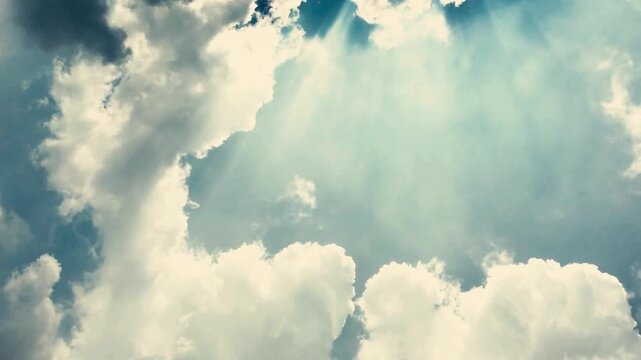 Silhouette of a fourengine turboprop military transport aircraft flying through dramatic clouds