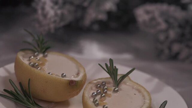 Citrus Posset Served with Rosemary Garnish