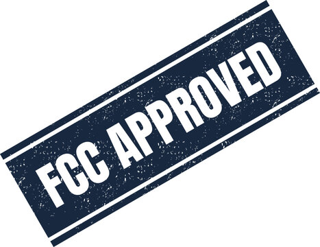 Rectangular dark blue rubber stamp featuring the text fcc approved on a clean white surface