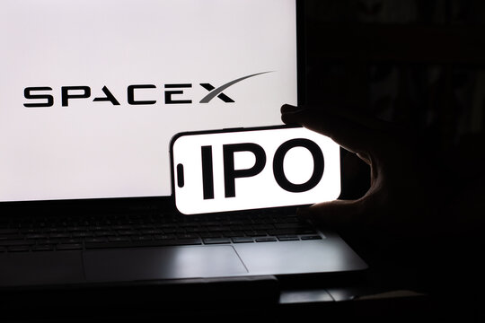 SpaceX IPO Concept on Laptop and Mobile Screen &mdash; Aerospace Company Stock Market Investment Editorial