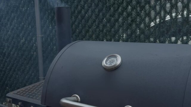 Black Outdoor Grill with Temperature Gauge and Smoking Chimney