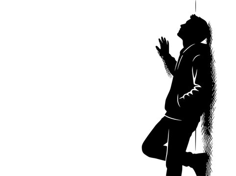 Silhouette of a person leaning against a wall, looking up, feeling trapped or thoughtful