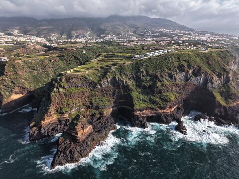 Aerial drone footage of the stunning coastal cliffs of Santa Ursula in North Tenerife, Spain, overlooking the Atlantic Ocean