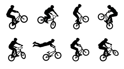 Obraz premium Silhouette of a man performing bicycle stunts.