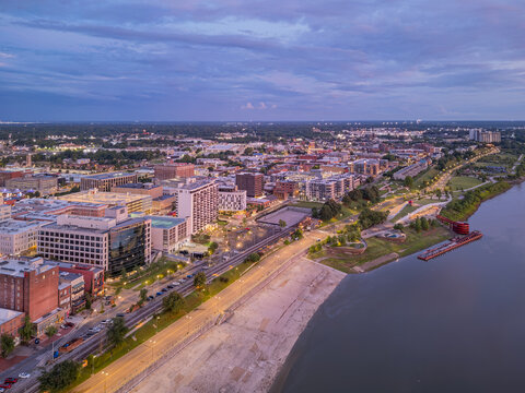 Aerial view of downtown Memphis skyline and Mississippi River at dusk