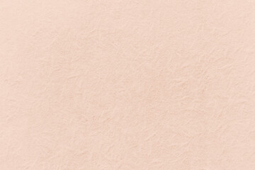Soft beige textured paper background with subtle handmade grain © Rawpixel.com