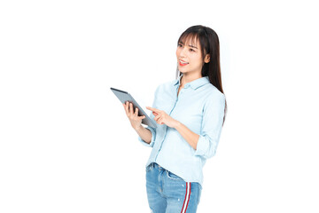 Smiling young woman using tablet on white background © CungTuan