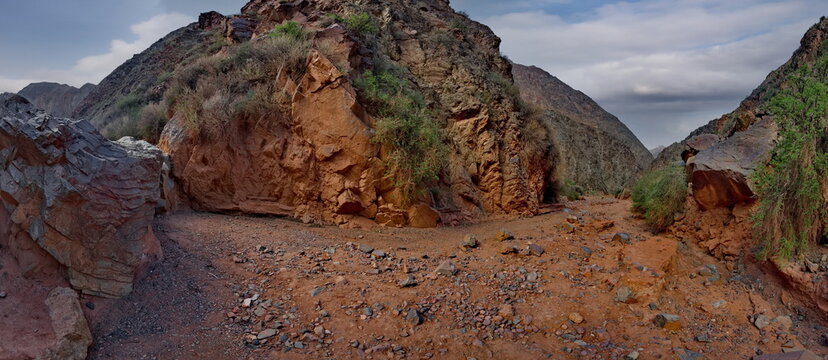 Northern Kyrgyzstan. Picturesque winding trails of the Kok Moinok canyons with red-brown rock along the Chu River.