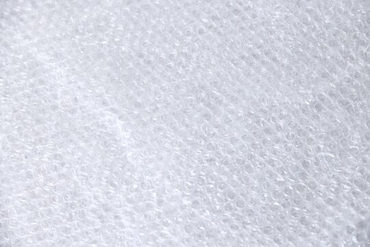 Transparent bubble wrap as background, above view. Packaging material