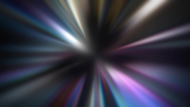 Animated prismatic starburst with radial light rays in purple, pink, and cyan bursting from dark center on black background. Spectrum light motion overlay for cinematic,