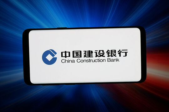 Stuttgart, Germany - 05-20-2026: In this photo illustration, the logo of financial company China Construction Bank CCB is displayed on a smartphone in front of abstract background on computer screen.