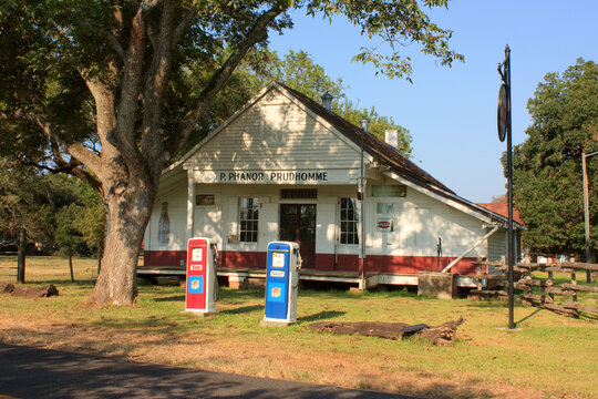 Vintage gas station with old Esso gas pumps in Cane River Creole National Historical Park in Natchitoches, Louisiana on September 14, 2019
