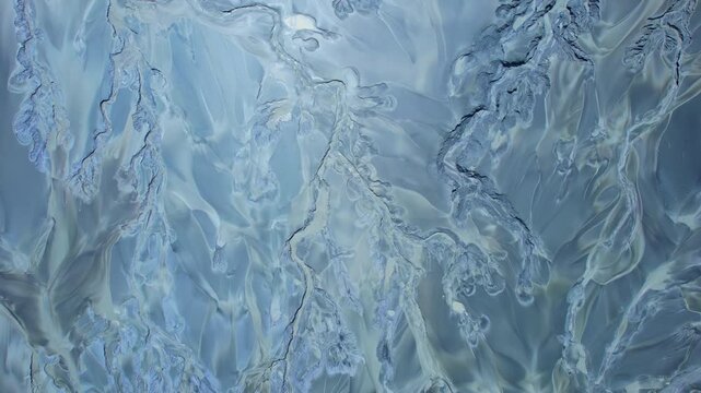 Surreal landscape of acid mine drainage waters from critical rare earth minerals excavate mine aerial view. Development operation for for Artificial intelligence AI technology, weapons and EV.