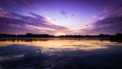 Obraz premium sunset over the river