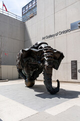 Naklejka premium Toronto, Ontario, Canada - June 2, 2026: Couch Monster Sculpture by artist Brian Jungen located outside the Art Gallery of Ontario in downtown Toronto, Ontario, Canada. 
