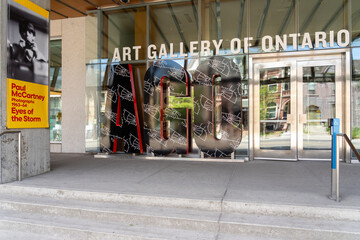 Naklejka premium Toronto, Ontario, Canada - June 2, 2026: The exterior entrance of the Art Gallery of Ontario (AGO) in downtown Toronto, Ontario, Canada. 
