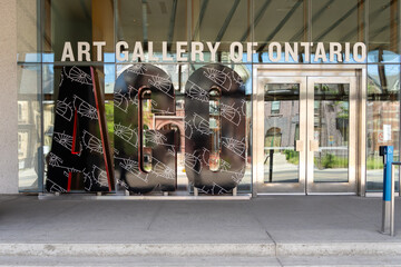Naklejka premium Toronto, Ontario, Canada - June 2, 2026: The exterior entrance of the Art Gallery of Ontario (AGO) in downtown Toronto, Ontario, Canada. 