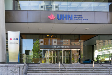 Naklejka premium Toronto, Ontario, Canada - June 2, 2026: The entrance to the Princess Margaret Cancer Centre, part of the University Health Network (UHN) on University Avenue in Toronto, Ontario, Canada. UHN is reco