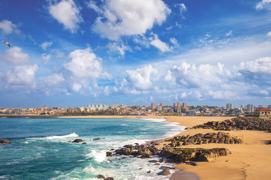 Beautiful bay on a sunny day. Douro Cabedelo Beach. View of Porto city, Portugal, Europe