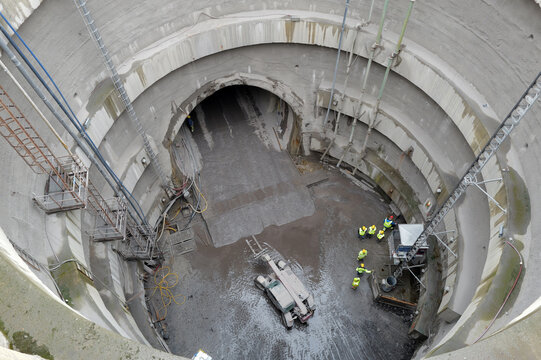 view of machines in the mining shaft of the tunnel construction under the city