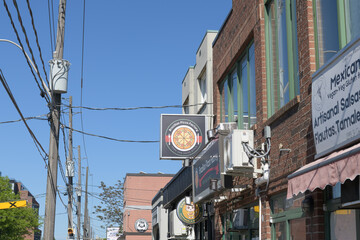 Naklejka premium projecting sign outside Brazilian Pizza Factory located at 2393 St Clair Av W, Toronto