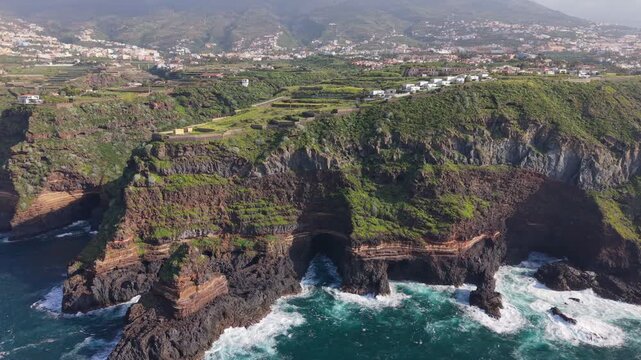 Aerial drone footage of the stunning coastal cliffs of Santa Ursula in North Tenerife, Spain, overlooking the Atlantic Ocean