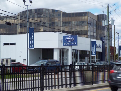Gatineau, Quebec, Canada &ndash; May 8, 2026:The "Subaru Outaouais" car dealership building with parked vehicles behind a fence on a cloudy day " at 965 Boulevard Saint-Joseph.