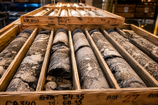 Geological core samples stored in wooden crates for analysis with earth science geology research rock formations geological survey drilling core logging earth s crust geological layers