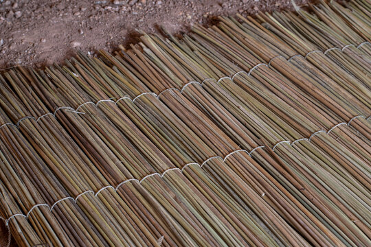 Woven juncus mat