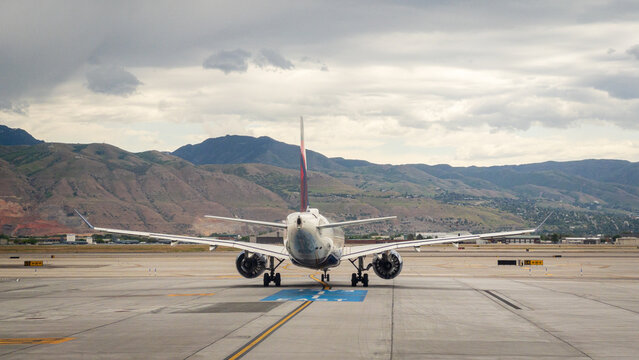 Jet Airliner Taxiing Toward The Runway