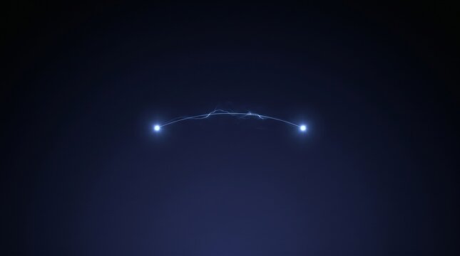 Two glowing light points connected by an electrical arc on black