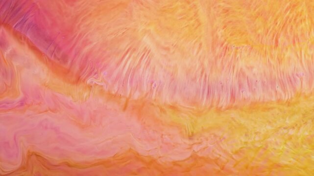 Exploring the vibrant movement of alcohol ink in abstract video art at an art studio