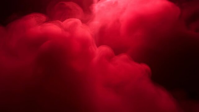 Dramatic red smoke movement creates ethereal atmosphere with dynamic flow