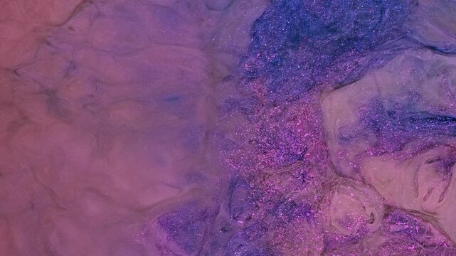 Creative exploration of alcohol ink in abstract video art with rich colors and textures