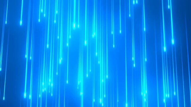 Tracking zoom of blue light streaks descending and streaming as glowing particle trails in dark abstract studio background