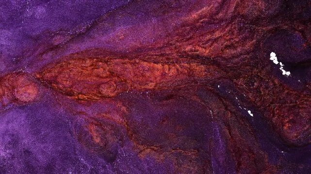 Exploring abstract patterns in alcohol ink through video art techniques