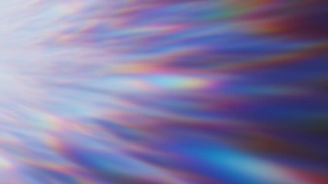 Slow pan of colorful prism light streaks shifting across reflective surface in studio backdrop, slow motion abstract refraction and gradient movement