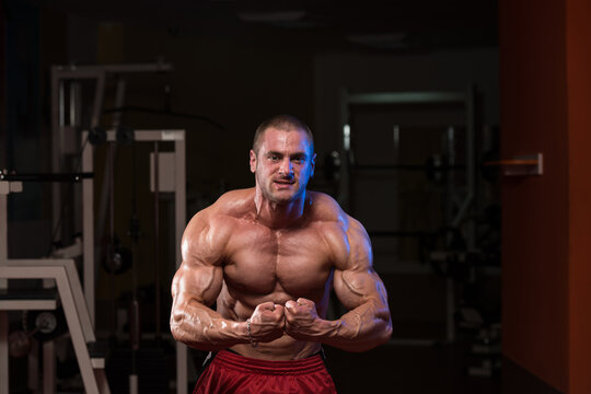 Handsome Body Builder Making Most Muscular Pose