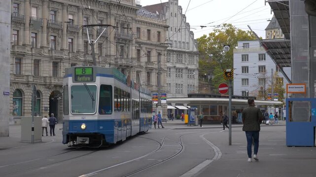 day time zurich city traffic street life tram station slow motion panorama 4k switzerland