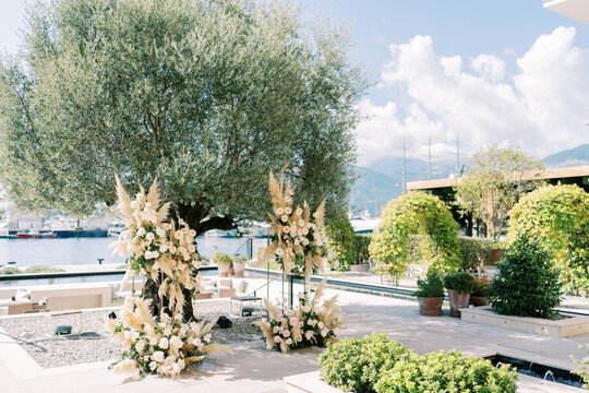Nautical outdoor ceremony with stylish modern touches and natural elements