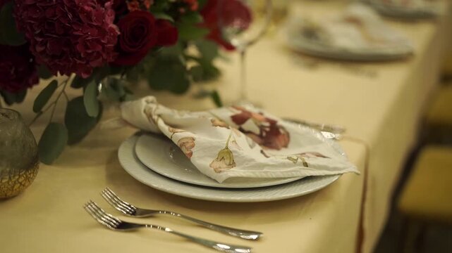 Exquisite dining display with decorative napkins and shining silverware