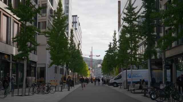day time zurich city modern block walking street slow motion panorama 4k switzerland