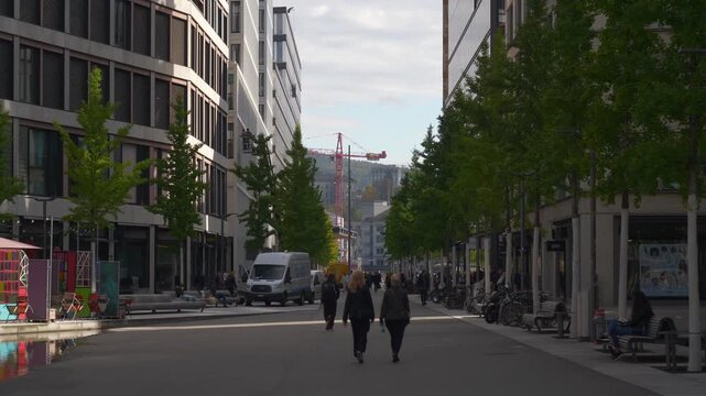 sunny day zurich city modern block walking street slow motion panorama 4k switzerland