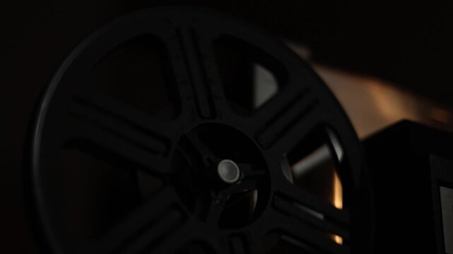 Film Projector Take Up Reel Spins During Movie