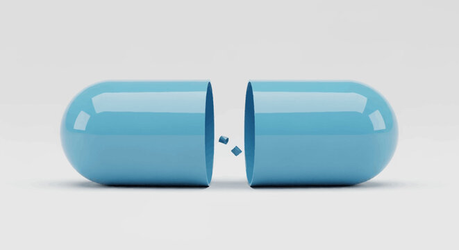 A blue medical capsule is split open on a clean white background