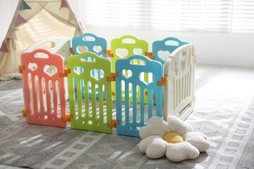 Beautiful playpen, pillow and wigwam in child's room © New Africa