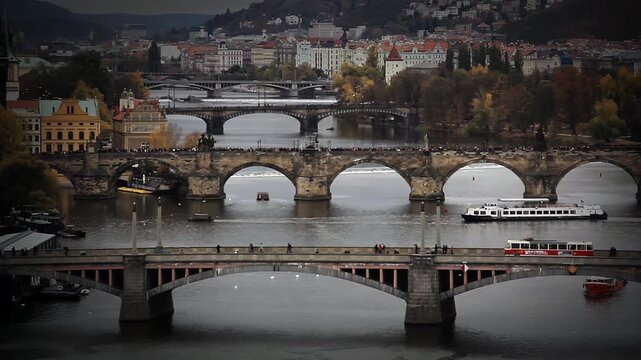 Elevated Perspective of Charles Bridge Area with Iconic Red Tram in Bohemia - 4K