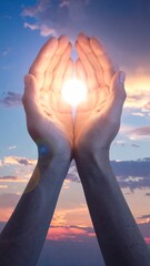 Open Hands Holding Bright Sunlight Against Colorful Sunset Sky © subur