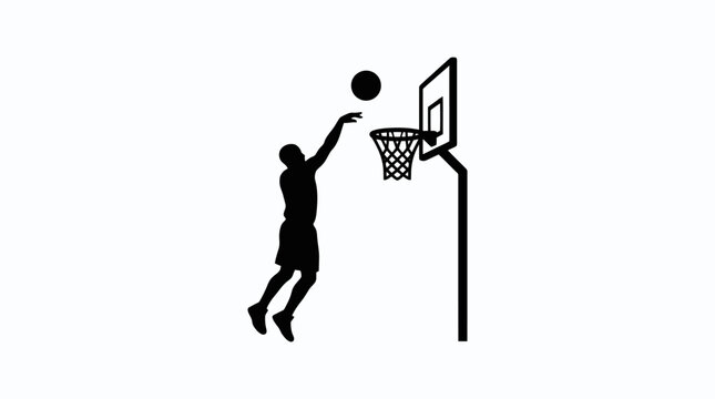 Silhouette of basketball player dunking ball.